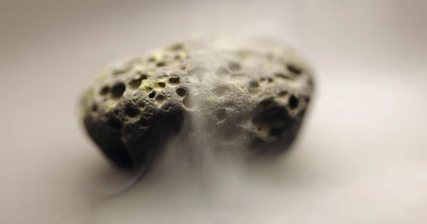 Smoke Whirling Small Meteorite Stone Closeup Footage — Stock Photo, Image