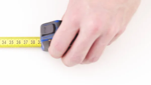 Extending Measuring Tape White Background Closeup Footage — Stock Photo, Image