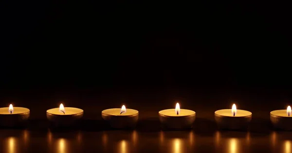 Candles Glowing Dark Background Closeup Footage — Stock Photo, Image