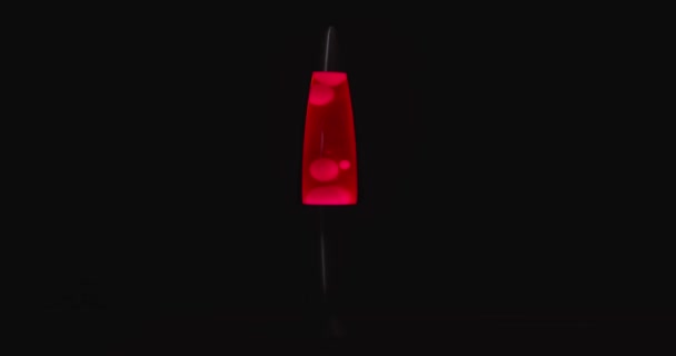 Czerwona Lampa Lawy Aginast Ciemne Odizolowane Tło Zbliżenie — Wideo stockowe