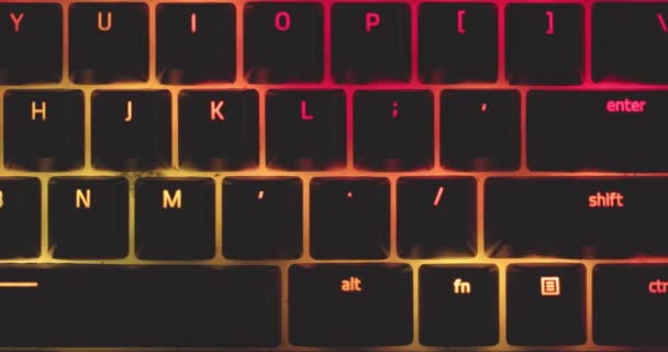Closeup of illuminated mechanical keyboard keys in motion — Stock Video