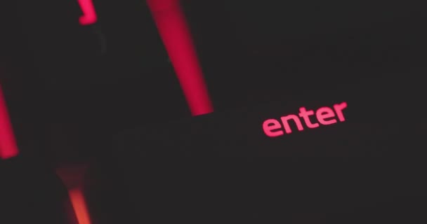 Red glowing enter key on mechanical keyboard — Stock Video