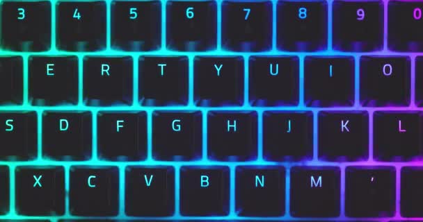 Closeup of illuminated mechanical keyboard keys in motion — Stock Video