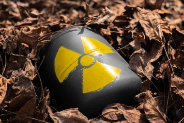 Radioactive waste thrown out as garbage clipart