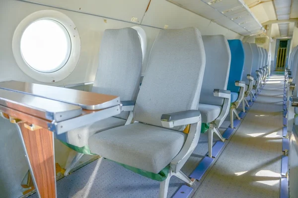 Interior of an airplane with many seats — Stock Photo, Image