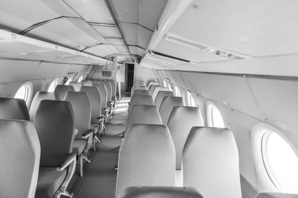 Interior of an airplane with many seats — Stock Photo, Image