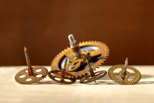 Old gears on table — Stock Photo, Image