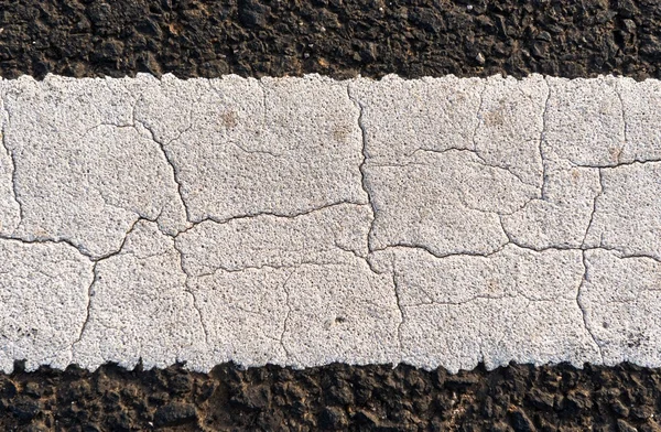 Bakgrund textur av grov asfalt — Stockfoto