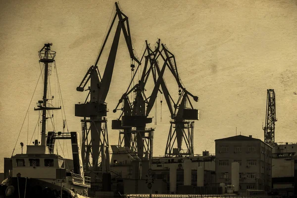 Industrial cargo cranes in the dock — Stock Photo, Image
