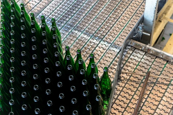 Many bottles on conveyor belt — Stock Photo, Image