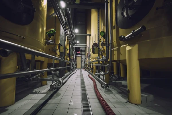 Industrial interior with welded silos