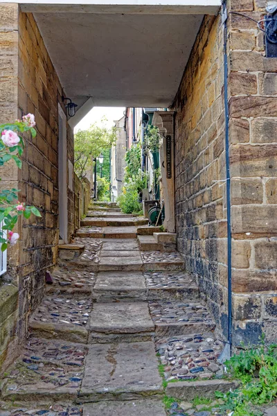 Robin Hood\'s Bay - small fishing village and a bay in in the North York Moors National Park. Robin Hood Bay village street scenes - North Yorkshire, England