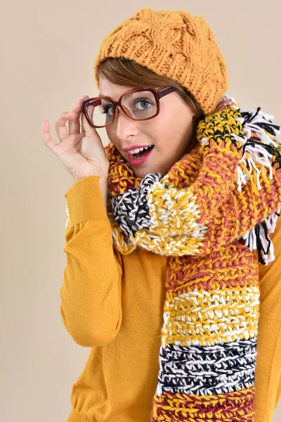 Girl wearing eyeglasses and winter accessories — Stock Photo, Image
