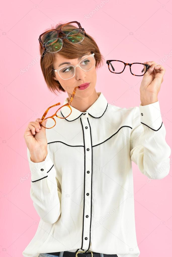 girl  choosing eyeglasses