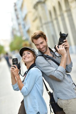 fotoğrafçılar ayakta kameralar ile