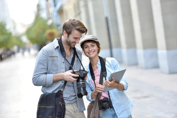 Photographers doing a photo reportage — Stock Photo, Image