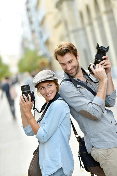 Photographers with cameras standing — Stock Photo, Image