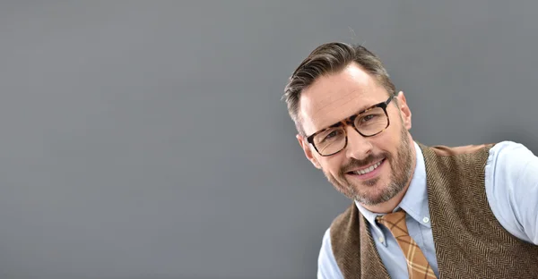 Man with eyeglasses on  standing — Stock Photo, Image