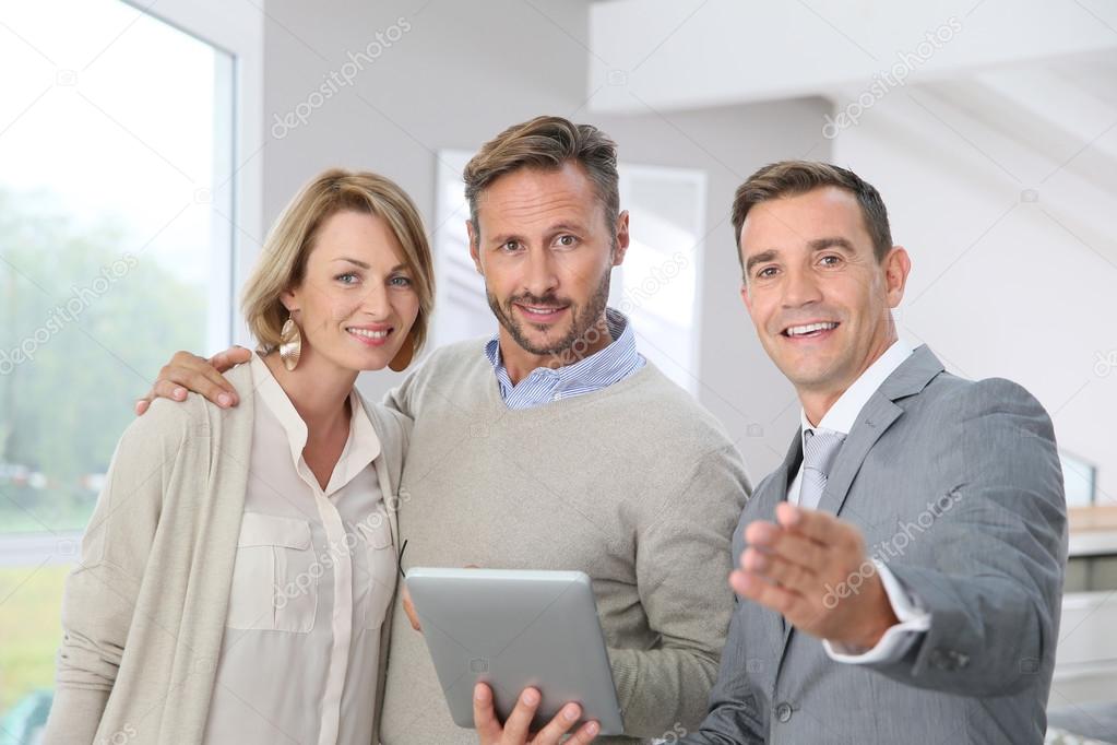 Realtor presenting new apartment