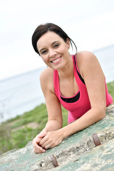 Woman in fitness outfit posing — Stock Photo, Image