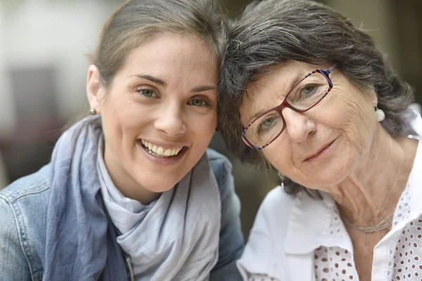 Woman with home carer smiling — Stock Photo, Image