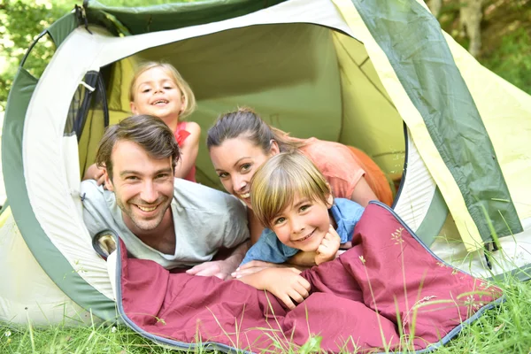 Happy fmaily in camp tent — Stock Photo, Image