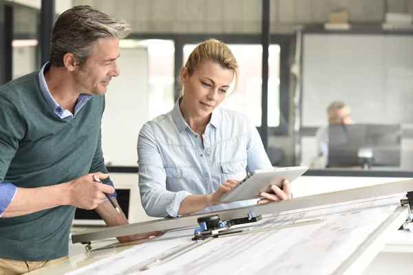 Architects working together on project — Stock Photo, Image