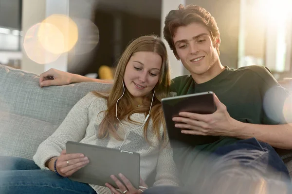 Young Couple Connected Digital Tablet Home Stock Picture