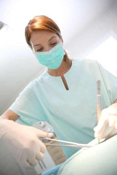 Surgeon woman in surgery room