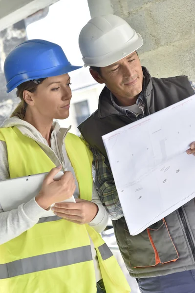 Construction team on building site — Stock Photo, Image