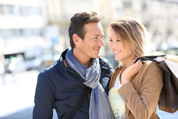 Couple in town doing shopping — Stock Photo, Image