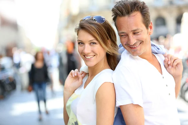 Stylish couple standing in street — Stock Photo, Image