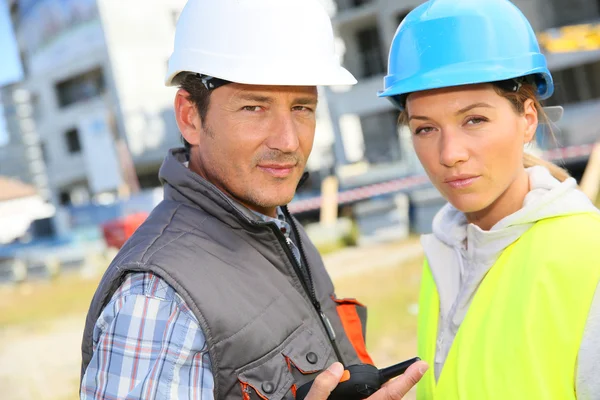 Construction partners on building site — Stock Photo, Image