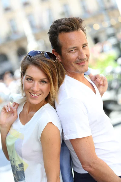 Stylish couple standing in street — Stock Photo, Image