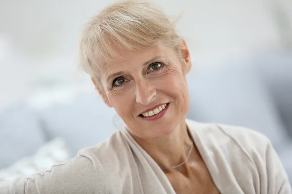 Smiling blond senior woman — Stock Photo, Image