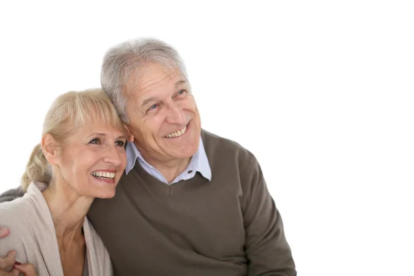 Senior couple looking on one side — Stock Photo, Image