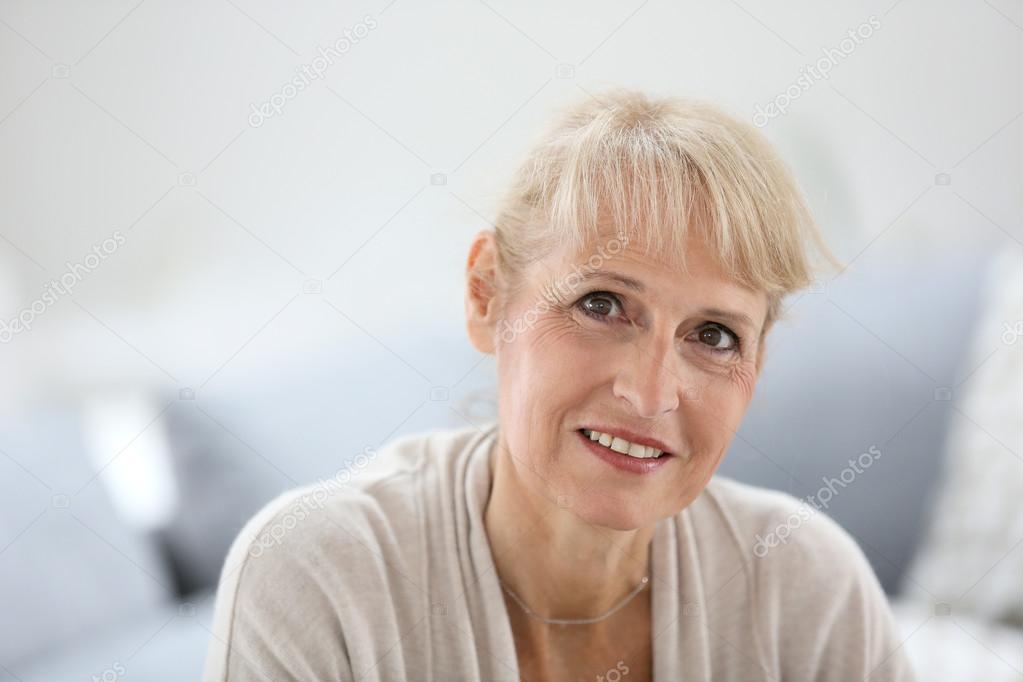 Smiling blond senior woman