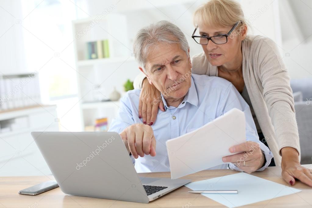 Couple doing income tax declaration online