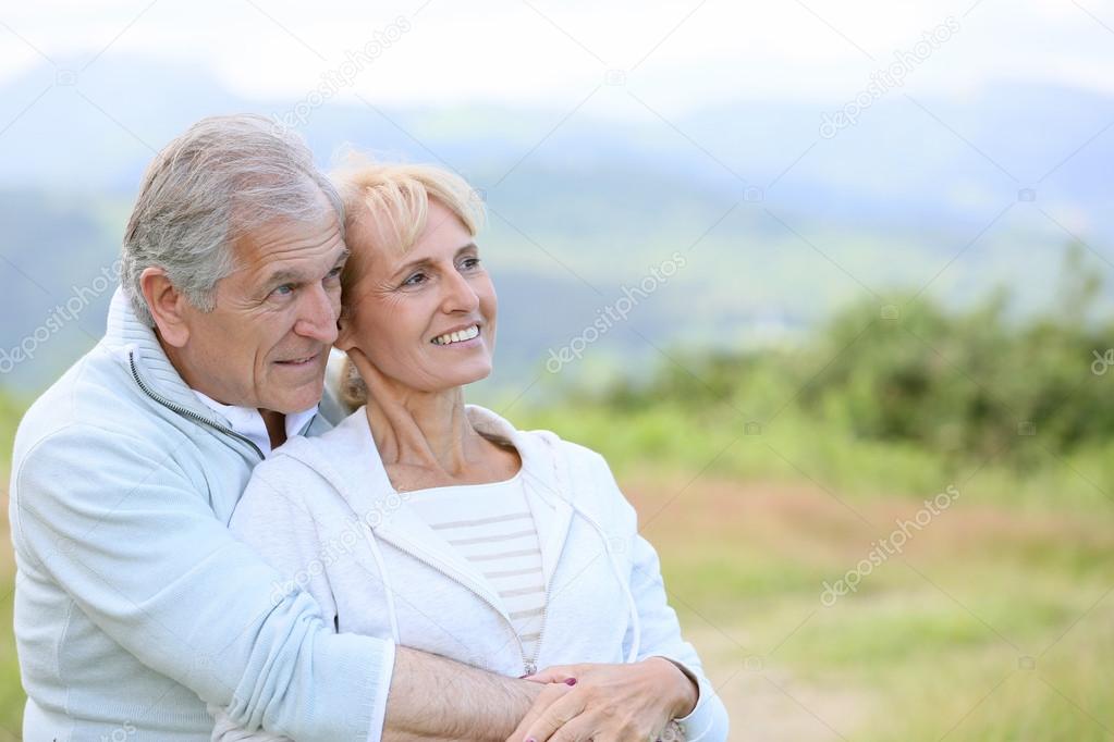 Senior couple looking towards future