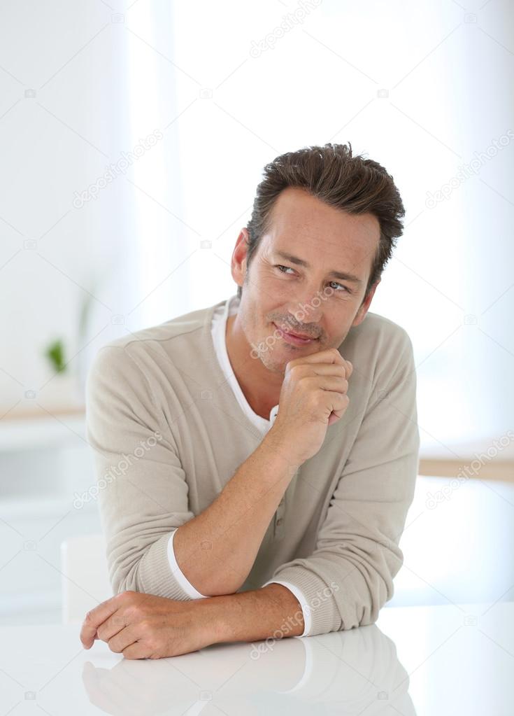 Handsome 40-year-old man — Stock Photo © Goodluz #53347013