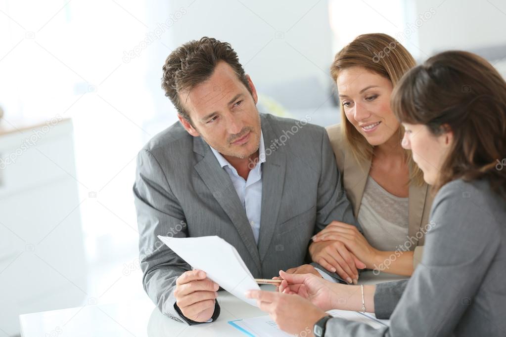 Couple meeting financial adviser