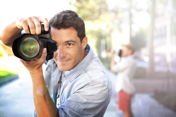 Jonge fotografen op trainingsdag — Stockfoto