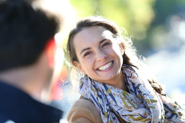 Girl pulling boyfriend by arm — Stock Photo, Image