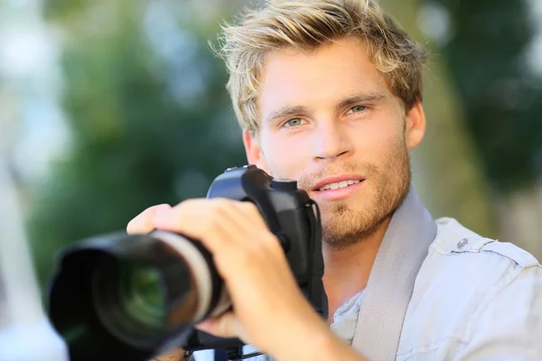 Photographer shooting with digital camera — Stock Photo, Image