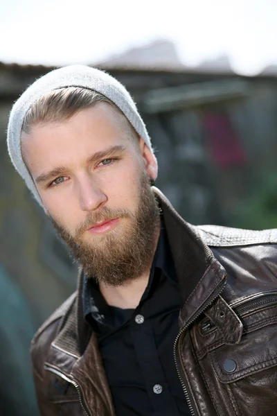 Stylish guy with beard in street — Stock Photo, Image
