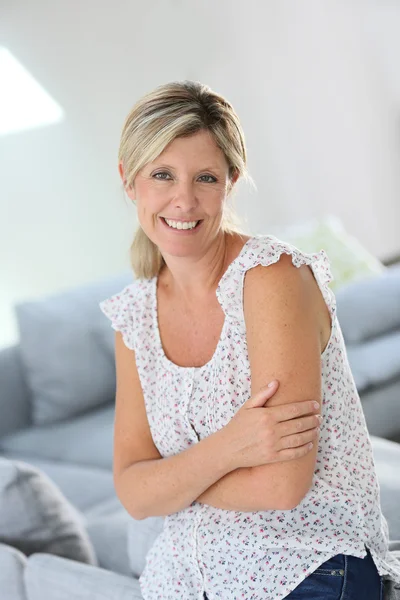 Beautiful 40-year old woman at home — Stock Photo, Image