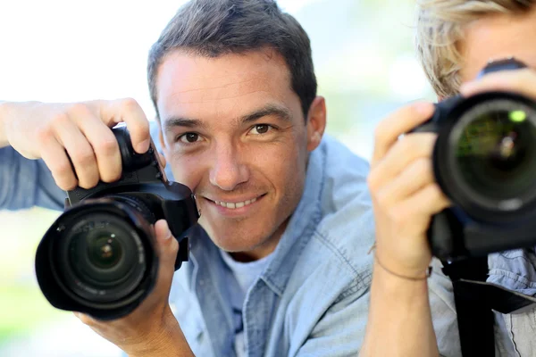 Män på fotografering träningsdag — Stockfoto