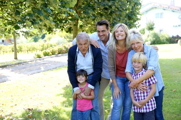 Happy family at grandparents's house — Stock Photo, Image