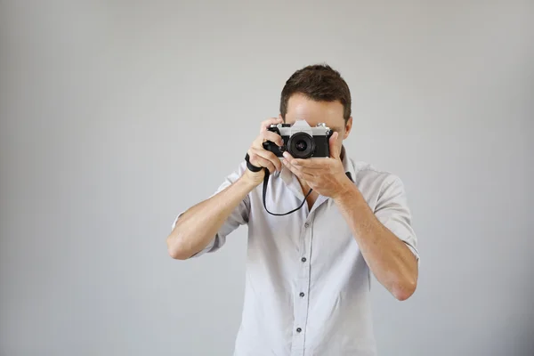 Fotógrafo com câmera vintage — Fotografia de Stock