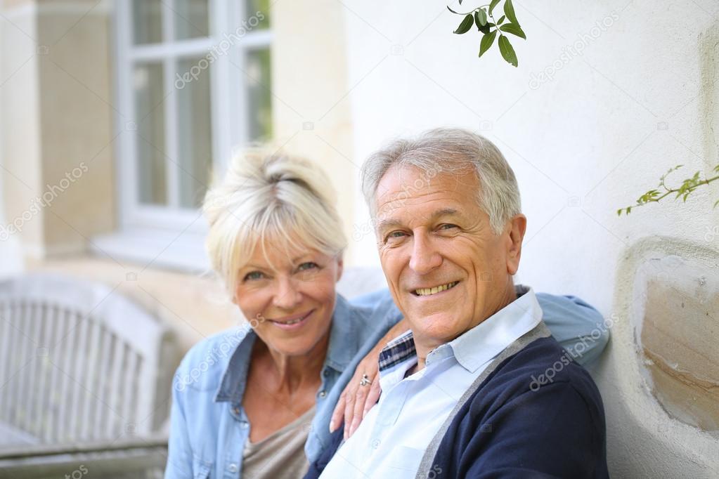 Senior couple relaxing on bench